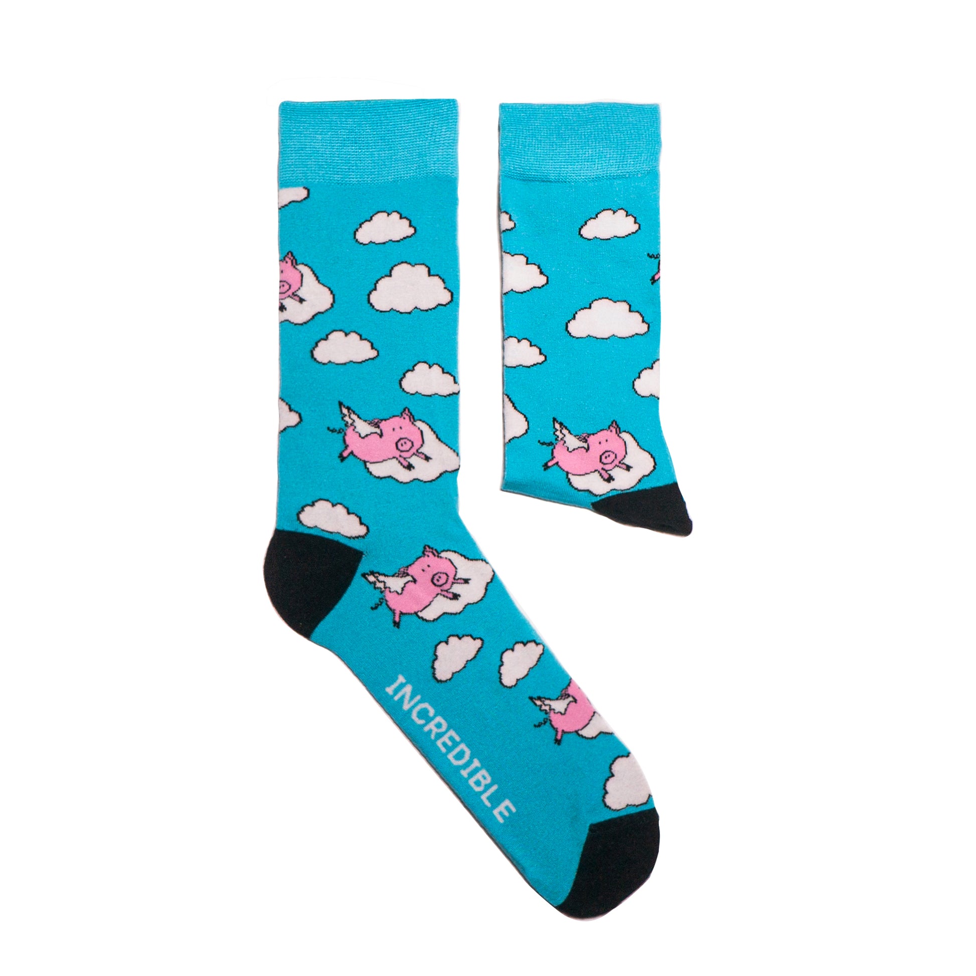 One of our most popular designs. The perfect shade of blue meets our lovable pink pigs - who said these guys could not fly! Soft. Strong. Sustainable. Comfortable. Pigs! On Socks. We know! Madness. Available in US Men’s 4-8 and 8-12
