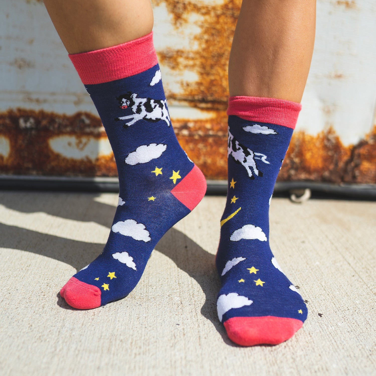Just like in the nursery rhyme when the cow jumped over the moon. A navy base sets the scene of a fantastical, fun, star-filled night sky. Cows. On Socks. We know! Available in US Men’s 4-8 and 8-12. Soft. Strong. Sustainable. Comfortable. Incredible Socks. Cow jumping over the moon socks.