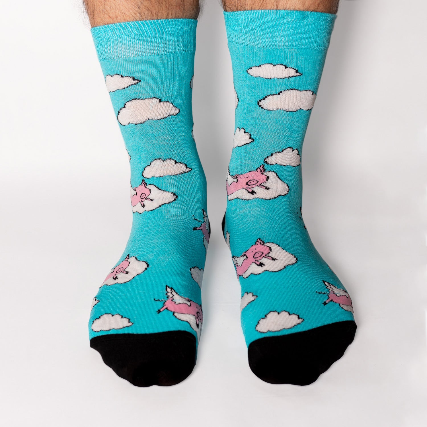 One of our most popular designs. The perfect shade of blue meets our lovable pink pigs - who said these guys could not fly! Soft. Strong. Sustainable. Comfortable. Pigs! On Socks. We know! Madness. Available in US Men’s 4-8 and 8-12