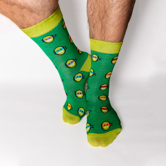 Turtle Power. A throwback to those afternoons spent in the retro video arcade. Or 1980s Saturday morning's spent watching the Ninja Turtles on TV. A collaboration with Andy Awesome, a Munich based 90's child who makes art out of the heroes of his childhood (and ours!).   Available in US Men’s 4-8 and 8-12. Soft. Strong. Comfortable. Sustainable. Incredible Socks. Ninja Turtles Socks