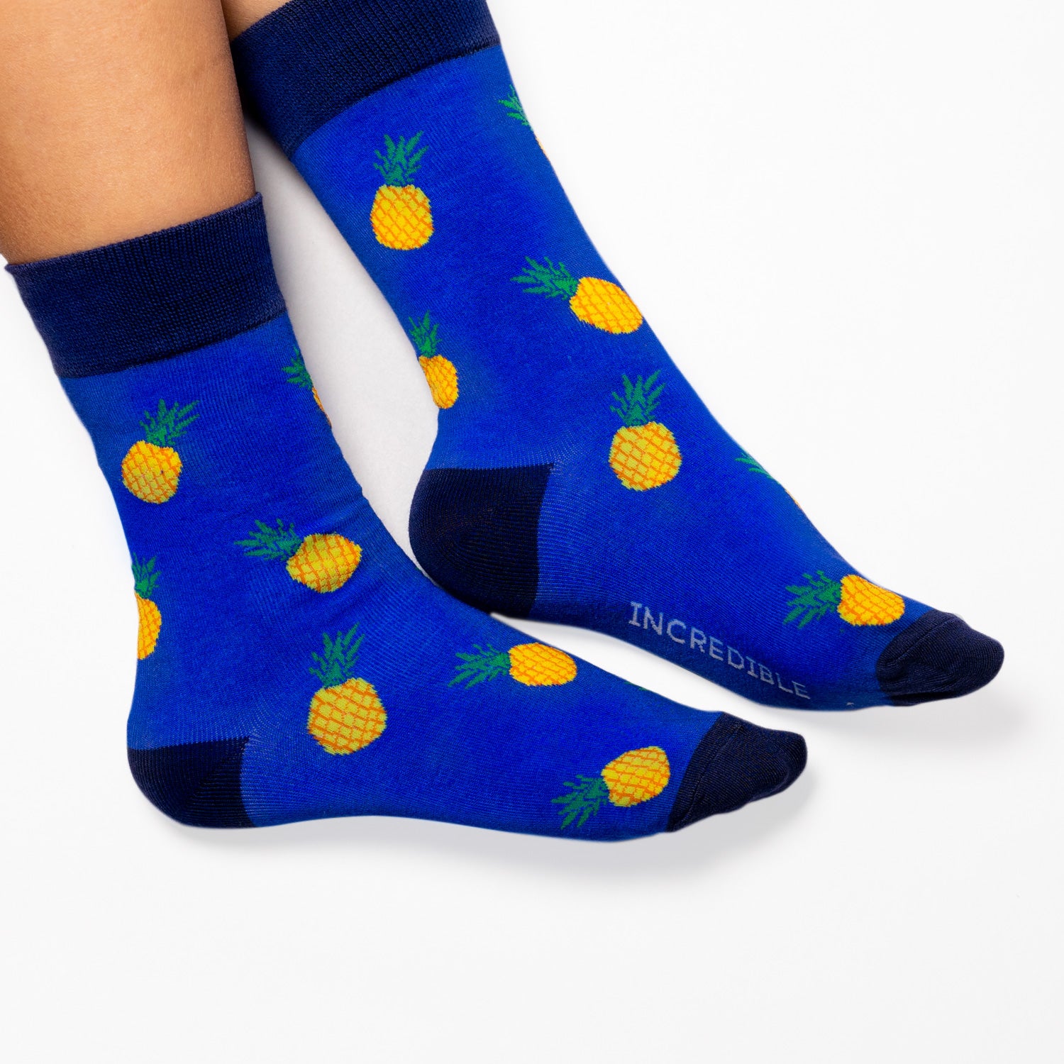 Pineapple Socks! Fruity. One in a series of five pairs of socks each representing your favorite fruits. Buy individually or as part of your 5-A DAY! Buy 4 in the collection and get your 5th fruity pair for FREE! The 5-A-DAY collection consists of Banana-rama, Strawberry Surprise, Cherry On Top, Perfect Pineapples and Melon Deliciousness. Soft. Strong. Sustainable. Comfortable. Available in US Men’s 4-8 and 8-12