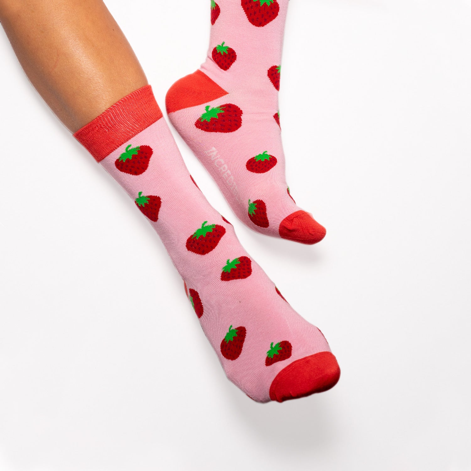 Strawberry Socks! Fruity. One in a series of five pairs of socks each representing your favorite fruits. Buy individually or as part of your 5-A DAY! Buy 4 in the collection and get your 5th fruity pair for FREE! Yum - strawberries. The 5-A-DAY collection consists of Banana-rama, Strawberry Surprise, Cherry On Top, Perfect Pineapples and Melon Deliciousness. Soft. Strong. Sustainable. Comfortable. Available in US Men’s 4-8 and 8-12