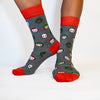 Holiday inspired christmas socks with elves, cake, snow globes and santa claus. made from bamboo