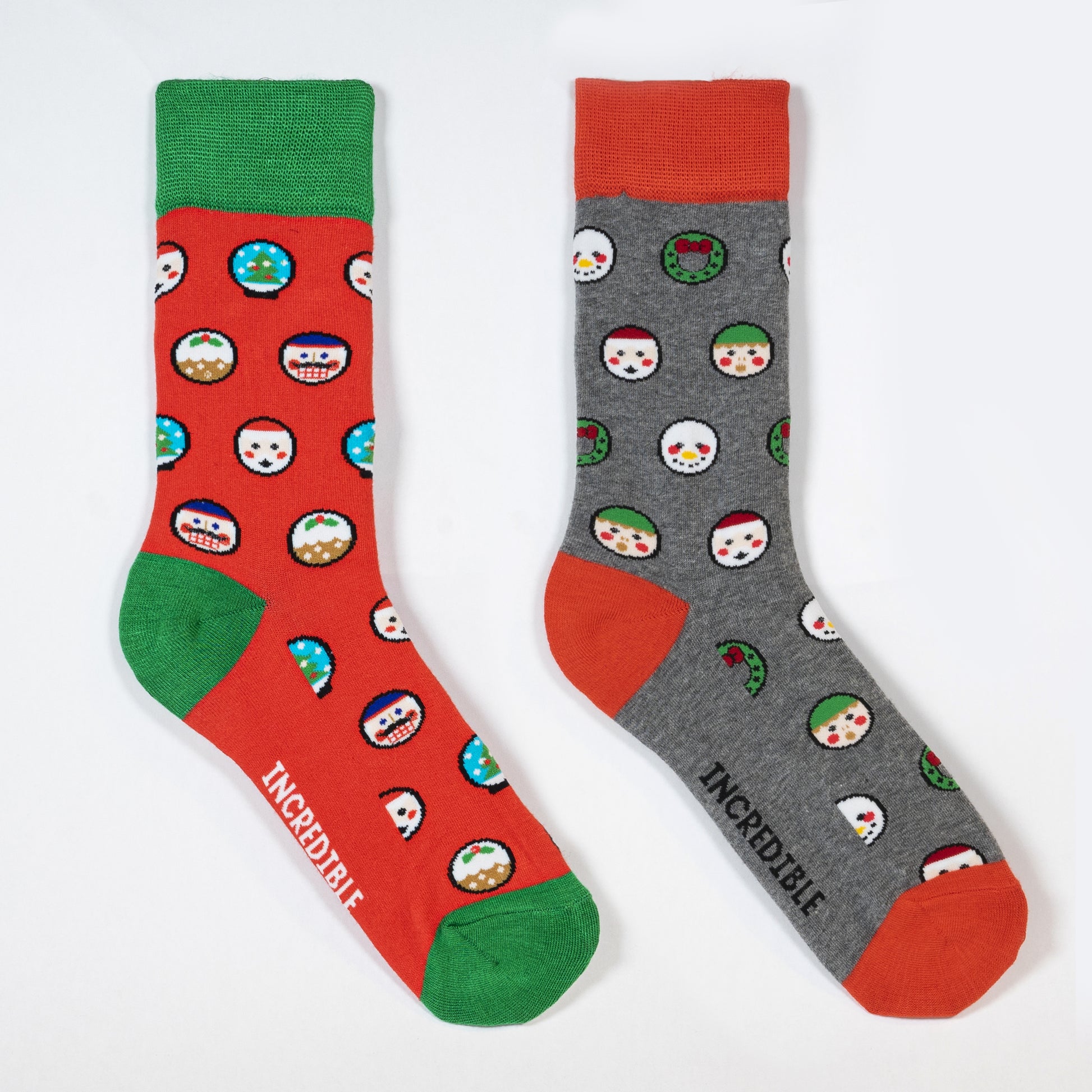 Holiday inspired christmas socks with elves, cake, snow globes and santa claus. made from bamboo